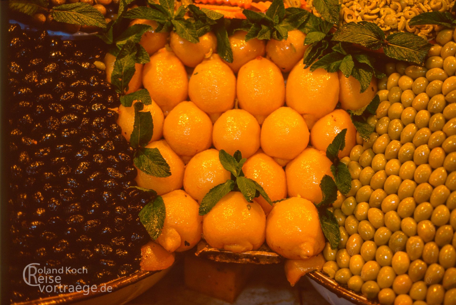 Moroccan cuisine - salted lemons and olives in the souk
